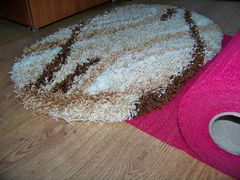 Anti-slip underlay for carpets